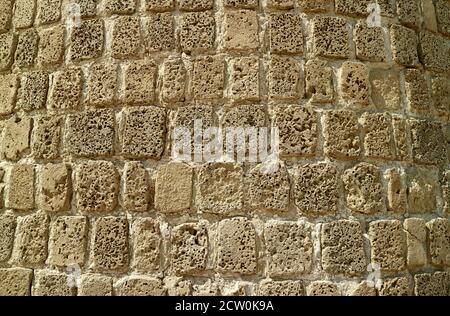 Stone Wall of the Ancient Bahrain Fort, UNESCO World Heritage Site in Manama, Bahrain Stock Photo