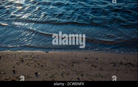 Detail of a Sicilian beach, with blue and crystal clear sea. Evening in the Mediterranean island Stock Photo