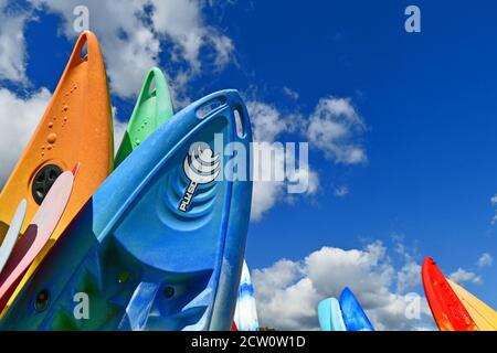 25th September2020. Colourful surf boards standing upright in Lock up against a dramatic cloudy sky of blue. Picture Credit Robert Timoney/Alamy/Stock Stock Photo