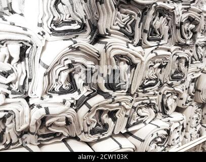 Rolled fabric textured cloth towels background Stock Photo
