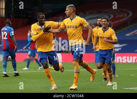 Everton's Richarlison (7) celebrates with team-mate Abdoulaye Doucoure (left) after scoring his side's second goal of the game from the penalty spot during the Premier League match at Selhurst Park, London. Stock Photo