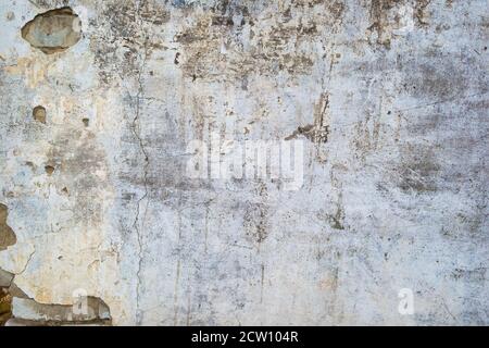 Cracked concrete wall texture or background. Closeup Stock Photo