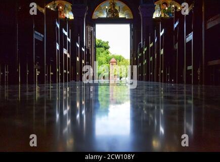 Empty Cathedral catholic church corridor with benches in Crete, Greece. Interior view Stock Photo