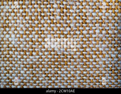 Knitted detailed wool wrap blanket. Texture of knitted wool cloth. Top view. Stock Photo