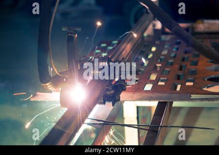 Plasma cutting of steel on a rack Stock Photo