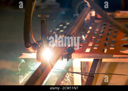 Plasma cutting of steel on a rack Stock Photo