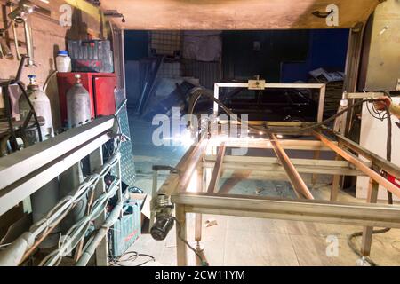 Plasma cutting of steel on a rack Stock Photo