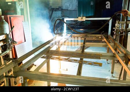 Plasma cutting of steel on a rack Stock Photo