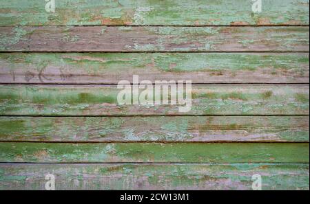 Green painted wooden planks background or texture. Closeup Stock Photo