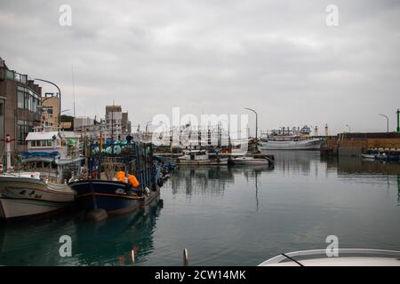 Guihou Harbor, TAIWAN - Jan, 2020: “Guihou Fishing Harbor” is a scenic little fishing village of leisure tourism on the north coastline. Travellers ca Stock Photo