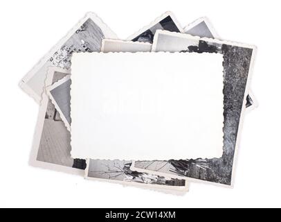 Stack of old photos isolated on white background Stock Photo