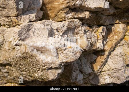 Fractured rocks from the final period of the Mesozoic Era (66 -145 million years ago), Selwicks Bay, Flamborough Head, North Yorkshire, UK Stock Photo