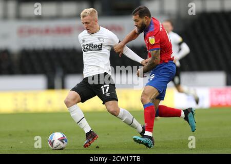 Derby County's Louie Sibley and Blackburn Rovers' Bradley Johnson during the Sky Bet Championship match at Pride Park, Derby. Stock Photo