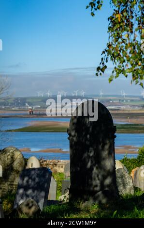 Grave stones overlooking River Torridge estuary Stock Photo