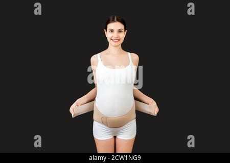 Premium Photo  Orthopedic corset on the female body isolated on a white  surface