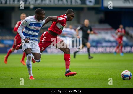 London, UK. 26th Sep, 2020. Bright Osayi-Samuel (11) of Queens Park Rangers in action with Marc Bola (27) of Middlesbrough. EFL Skybet Championship match, Queens Park Rangers v Middlesbrough at The Kiyan Prince Foundation Stadium, Loftus Road in London on Saturday 26th September 2020. this image may only be used for Editorial purposes. Editorial use only, license required for commercial use. No use in betting, games or a single club/league/player publications. pic by Tom Smeeth/Andrew Orchard sports photography/17�Թ����� Live news Credit: Andrew Orchard sports photography/17�Թ����� Live News Stock Photo