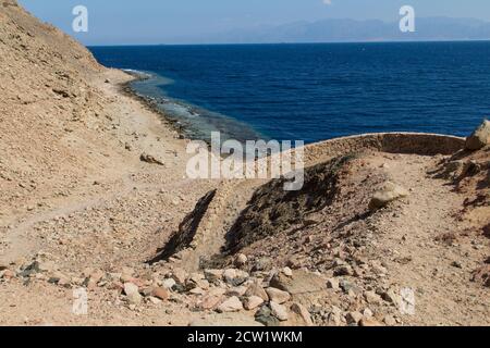 The coastline of the Red Sea and the mountains in the background. Egypt, the Sinai Peninsula, Dahab. Stock Photo