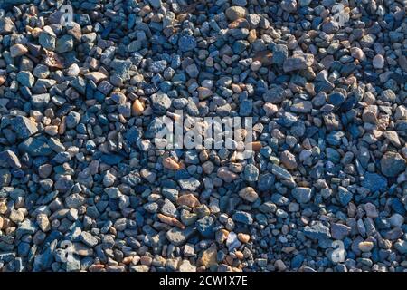 Crushed stones texture background. Stones construction rocks. Stock Photo