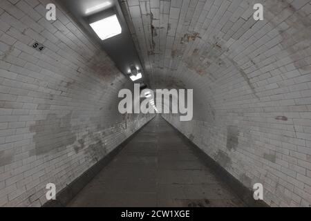 Greenwich foot tunnel crosses beneath the River Thames in East London, United Kingdom Stock Photo