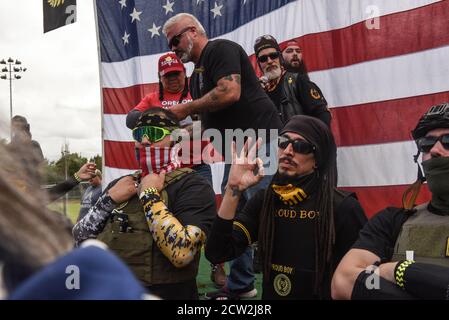 Portland, OREGON, USA. 26th Sep, 2020. The Proud Boys hold a rally in Portland, Oregon, U.S. September 26, 2020. Governor Kate Brown declared a state of emergency prior to Saturdays rally as fears of political violence between Proud Boys and Black Lives Matter protesters grew. Credit: Stephanie Keith/ZUMA Wire/Alamy Live News Stock Photo