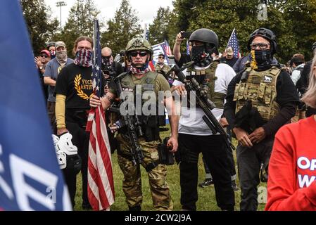 Portland, OREGON, USA. 26th Sep, 2020. The Proud Boys hold a rally in Portland, Oregon, U.S. September 26, 2020. Governor Kate Brown declared a state of emergency prior to Saturdays rally as fears of political violence between Proud Boys and Black Lives Matter protesters grew. Credit: Stephanie Keith/ZUMA Wire/Alamy Live News Stock Photo