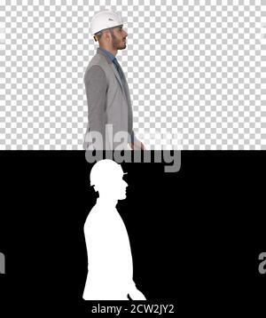 Architect in white helmet walking, Alpha Channel Stock Photo