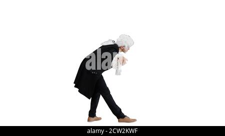 Man dressed as a courtier of 17-18 century greets someone on whi Stock Photo