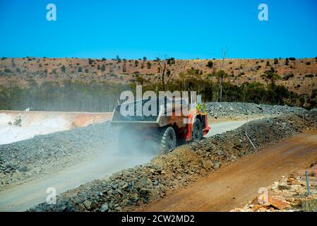 Mining Dump Truck in Open Pit Mine Stock Photo