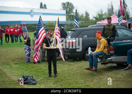 Portland, Oregon, USA. 26th September, 2020.  Proud Boys during the End to Domestic Terrorism Rally in support of Kenosha shooter Kyle Rittenhouse and Aaron 'Jay' Danielson who was shot dead by an antifascist protester during the ongoing Black Lives Matter protests in the city. Credit: Albert Halim/Alamy Live News Stock Photo