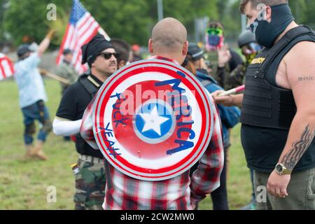 Portland, Oregon, USA. 26th September, 2020.  Proud Boys during the End to Domestic Terrorism Rally in support of Kenosha shooter Kyle Rittenhouse and Aaron 'Jay' Danielson who was shot dead by an antifascist protester during the ongoing Black Lives Matter protests in the city. Credit: Albert Halim/Alamy Live News Stock Photo