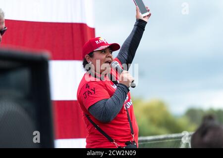 Portland, Oregon, USA. 26th September, 2020.  Oregon Women for Trump Organizer speaks during Proud Boys' End to Domestic Terrorism Rally in support of Kenosha shooter Kyle Rittenhouse and Aaron 'Jay' Danielson who was shot dead by an antifascist protester during the ongoing Black Lives Matter protests in the city. Credit: Albert Halim/Alamy Live News Stock Photo