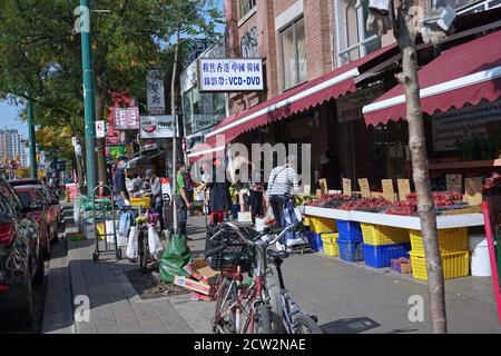 Toronto, Canada - September 25, 2020: Toronto has a large immigrant population and a large and colorful downtown ethnic shopping district, with Chines Stock Photo