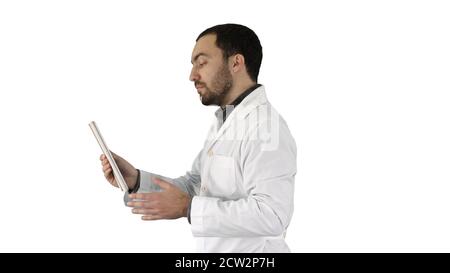Young Doctor Video Chatting On Tablet on white background. Stock Photo