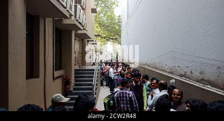 CITY DELHI, INDIA - JANUARY 25, 2020: Indian workers crowd at company courtyard for annual meeting. Stock Photo