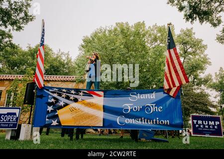 Lauren Boebert gives her stump speech at a political rally in Colorado