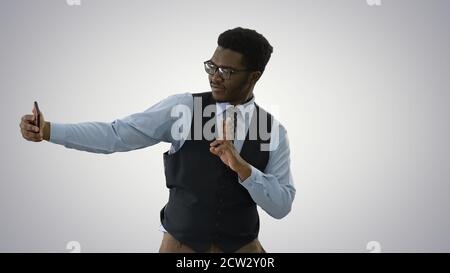 African american businessman making selfies with his phone while Stock Photo