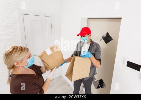 A man and a woman taking a selfie in a room Stock Photo