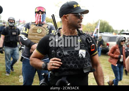 Portland, USA. 26th Sep, 2020. Left and right wing demonstrators clash in Delta Park on September 26, 2020 in Portland Oregon. Western chauvinists that engage in political violence, The Proud Boys, are known for disseminating misinformation and having contentious and violent confrontations with the antifascist group Eugene Antifa. This alternate location to downtown Portland is located in the grater area, once the site of Vanport City that was wiped out by floods in 1948. (Photo by John Lamparski/SIPA USA) Credit: Sipa USA/Alamy Live News Stock Photo