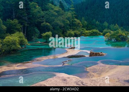 The turquoise color pools in Huanglong Valley, in Sichuan province, China. Stock Photo