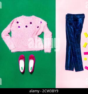 Purple girl top cloth with a jeans pants isolated Stock Photo