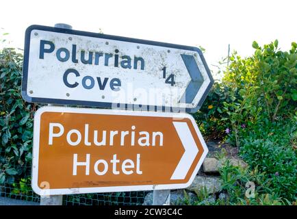 Signs for Polurrian Cove and Polurrian Hotel in Mullion on the Lizard Peninsula. Stock Photo