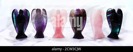 Crystals of amethyst and rose quartz. Gems on a white background ...