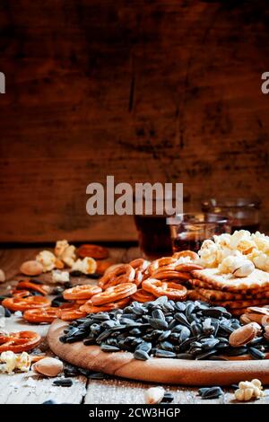 Sunflower seeds roasted salted, a plate of snacks, selective focus Stock Photo