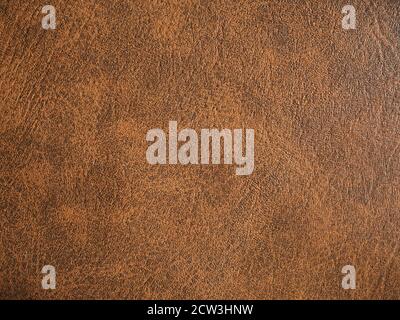 brown leatherette faux leather texture useful as a background Stock Photo