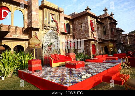 Jodhpur, Rajasthan, India, August 20th, 2020: Colorful decorated indian wedding stage for bride and groom for wedding ceremony in backyard or lawn, we Stock Photo