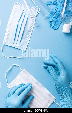 Medical gloves mask and alcohal gel for protecting infection during Coronavirus pandemic Stock Photo