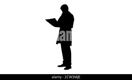 Silhouette Frustrated male doctor examining computed tomography Stock Photo