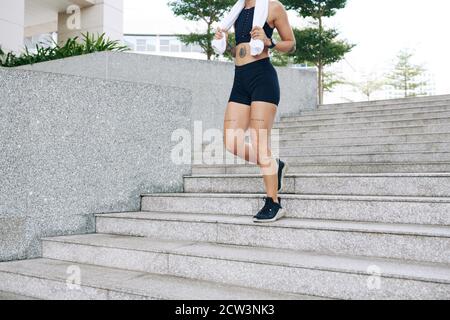 Running sporty woman Stock Photo