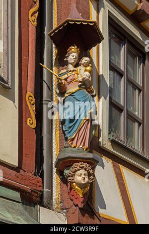 statue of the Virgin Mary on a house wall, Hesse, Germany