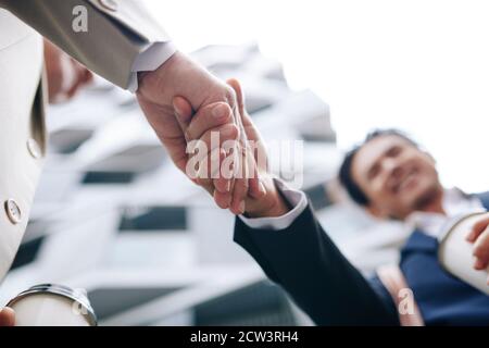 Business partners shaking hands Stock Photo